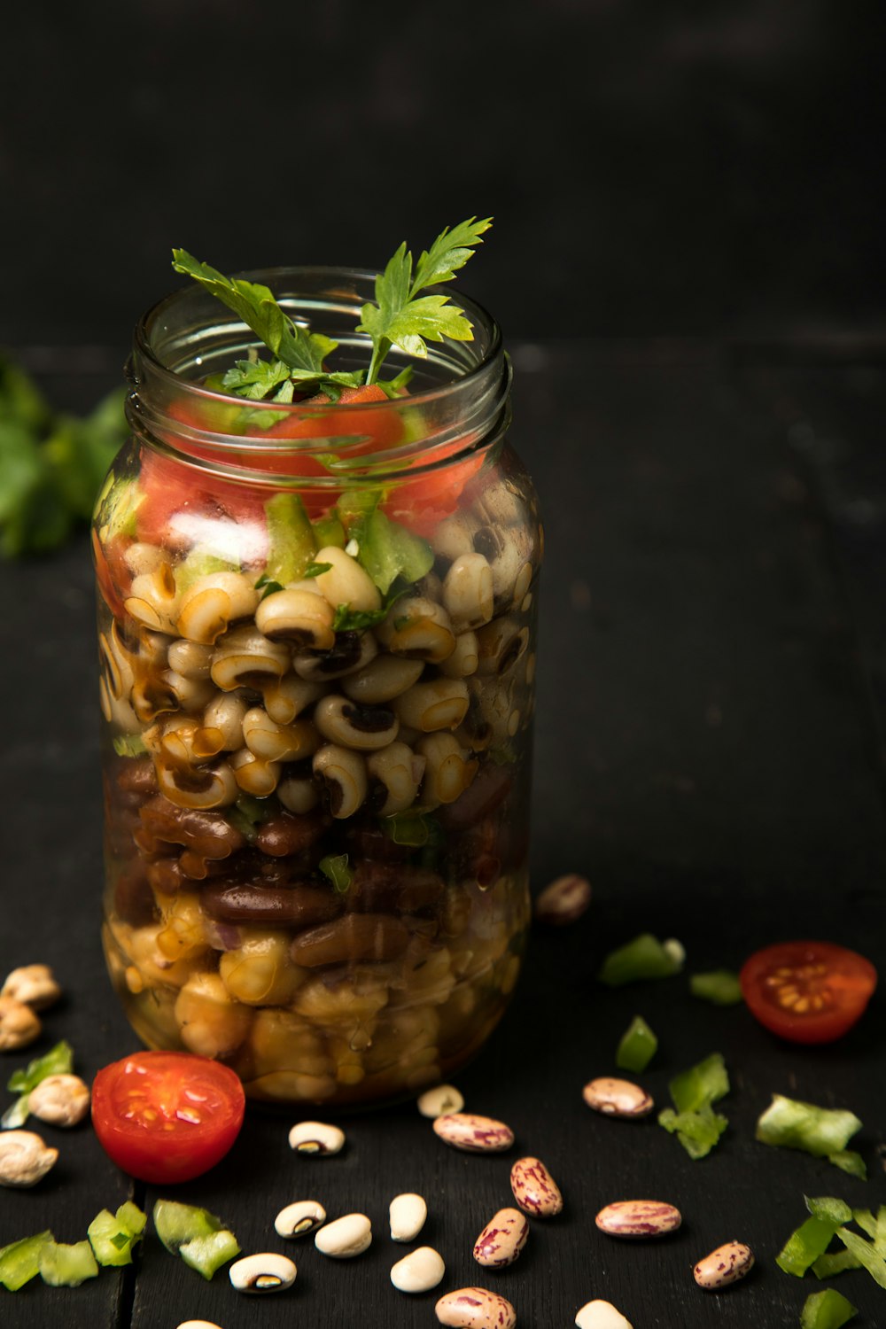 clear glass jar with white and green plant