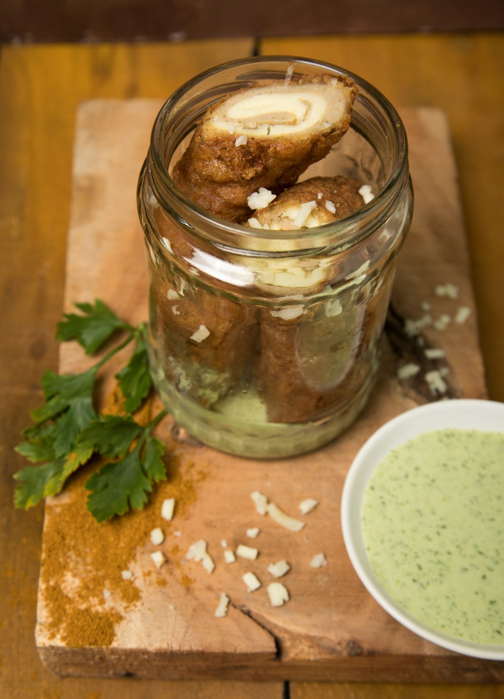 clear glass jar with brown food