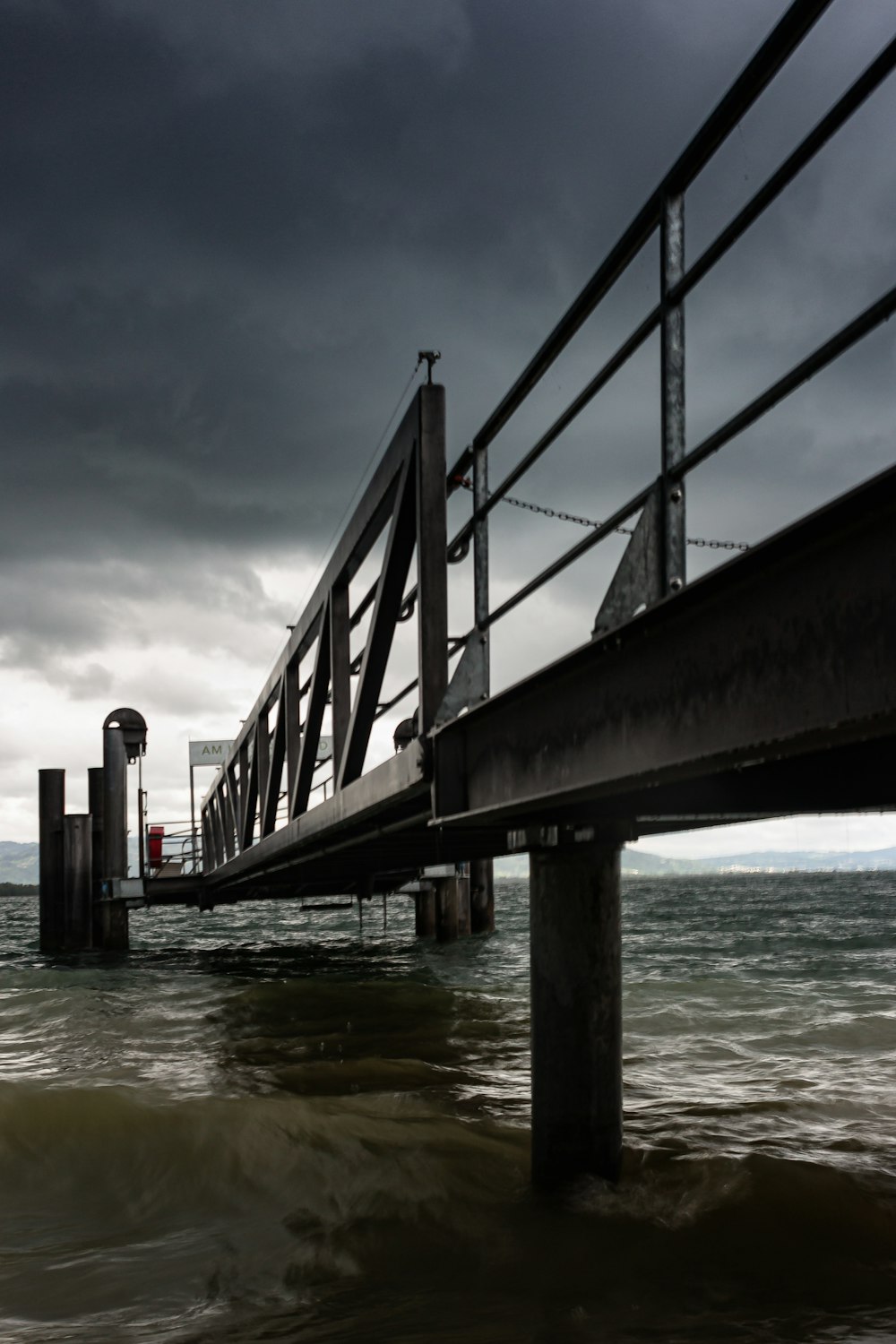 gray bridge over the sea