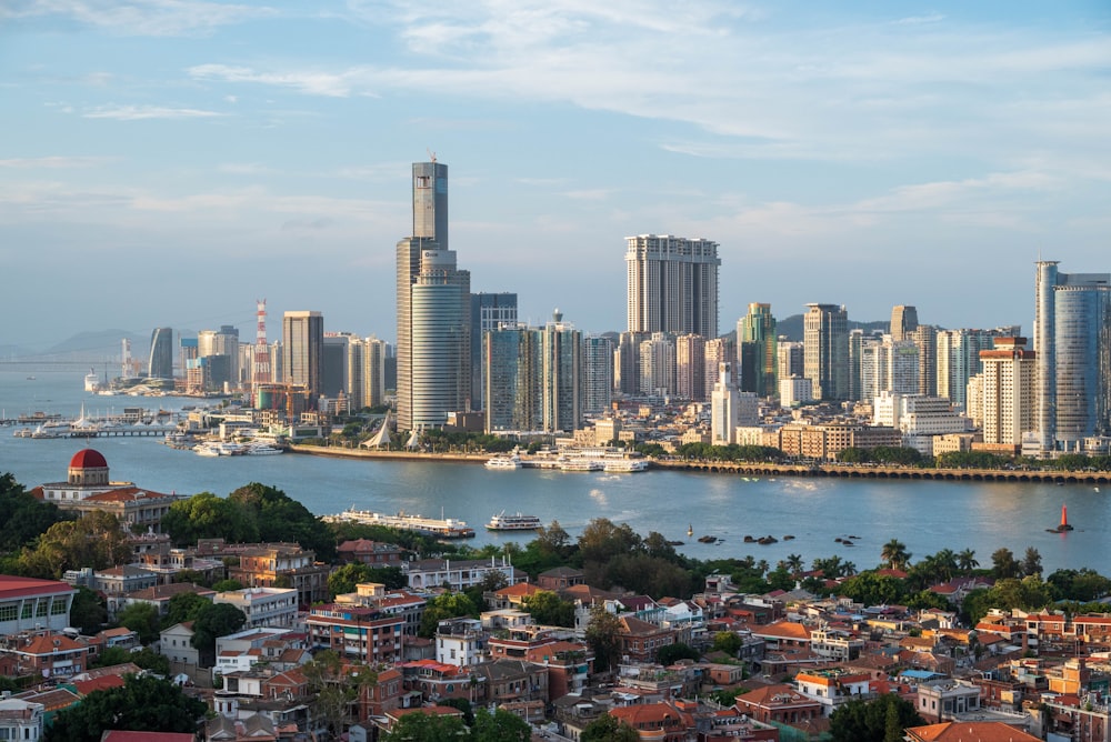 city skyline under blue sky during daytime