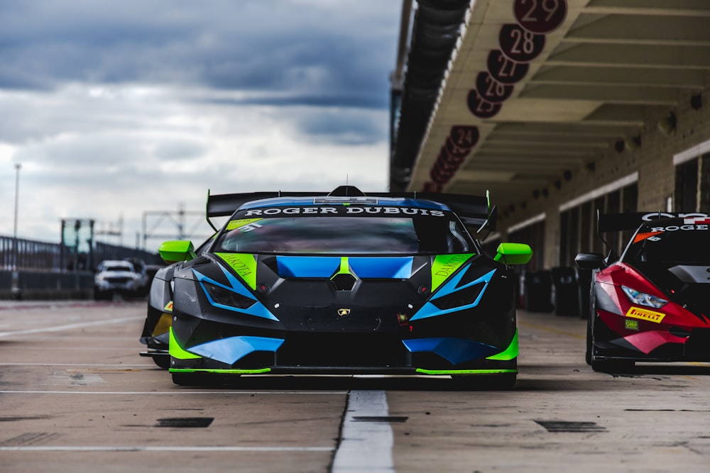 blue and green lamborghini aventador