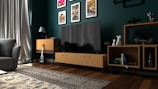 black flat screen tv on brown wooden tv rack