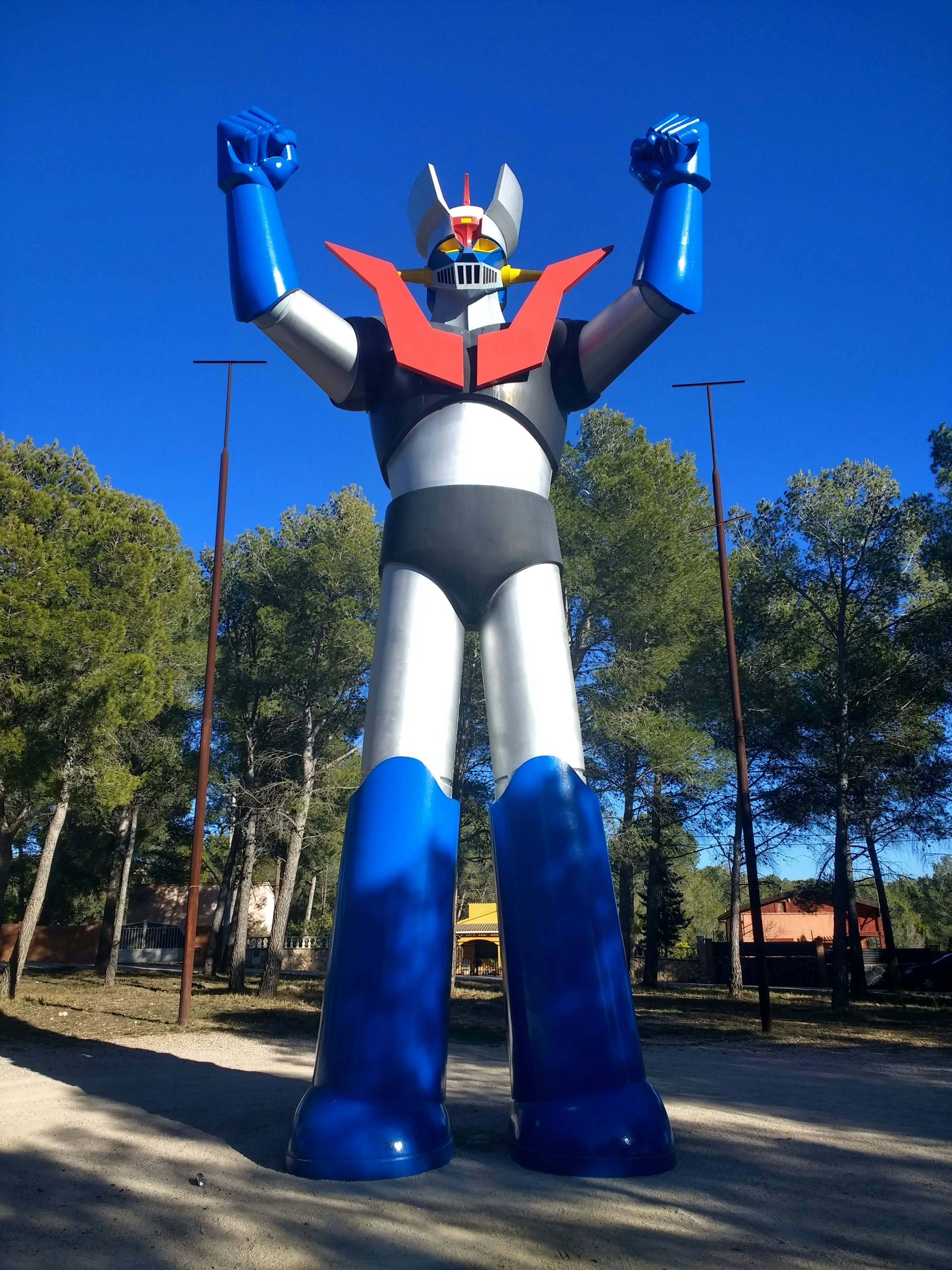 Blue And Brown Robot Statue Photo Free Alt Camp Image On Unsplash