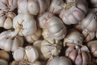 garlic lot on black surface