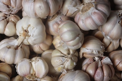 garlic lot on black surface