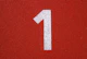 white and red arrow sign