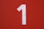 white and red arrow sign