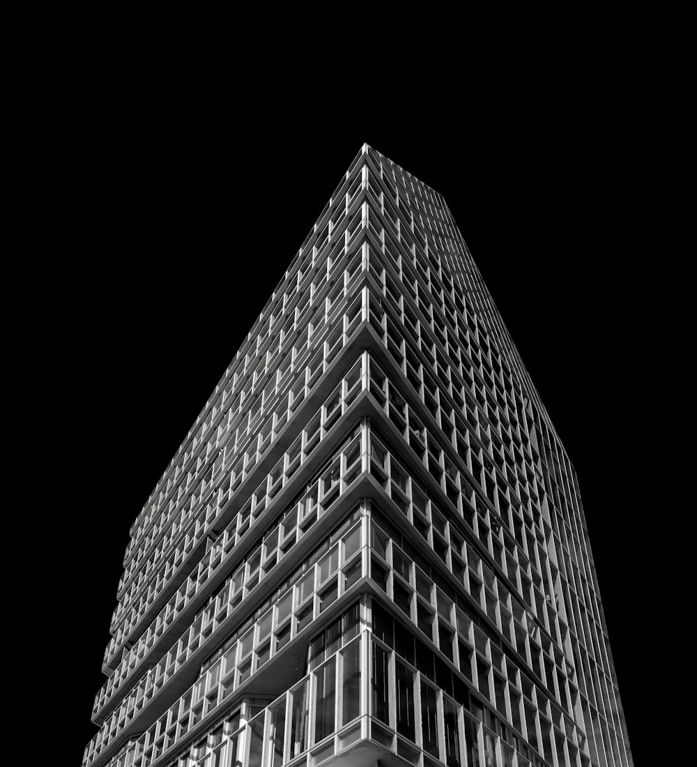 grayscale photo of high rise building