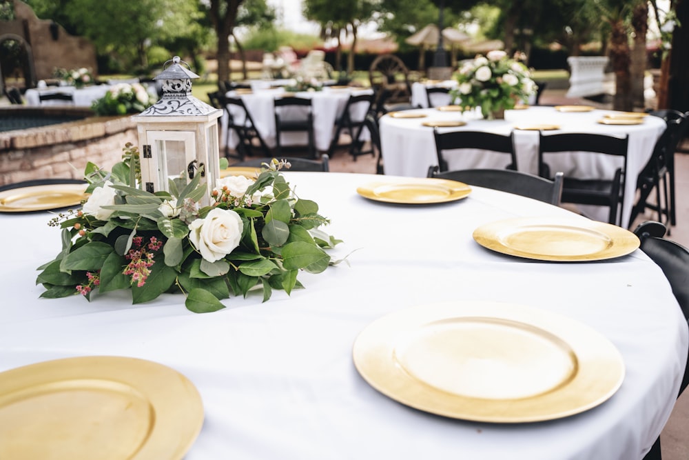 white roses on white table