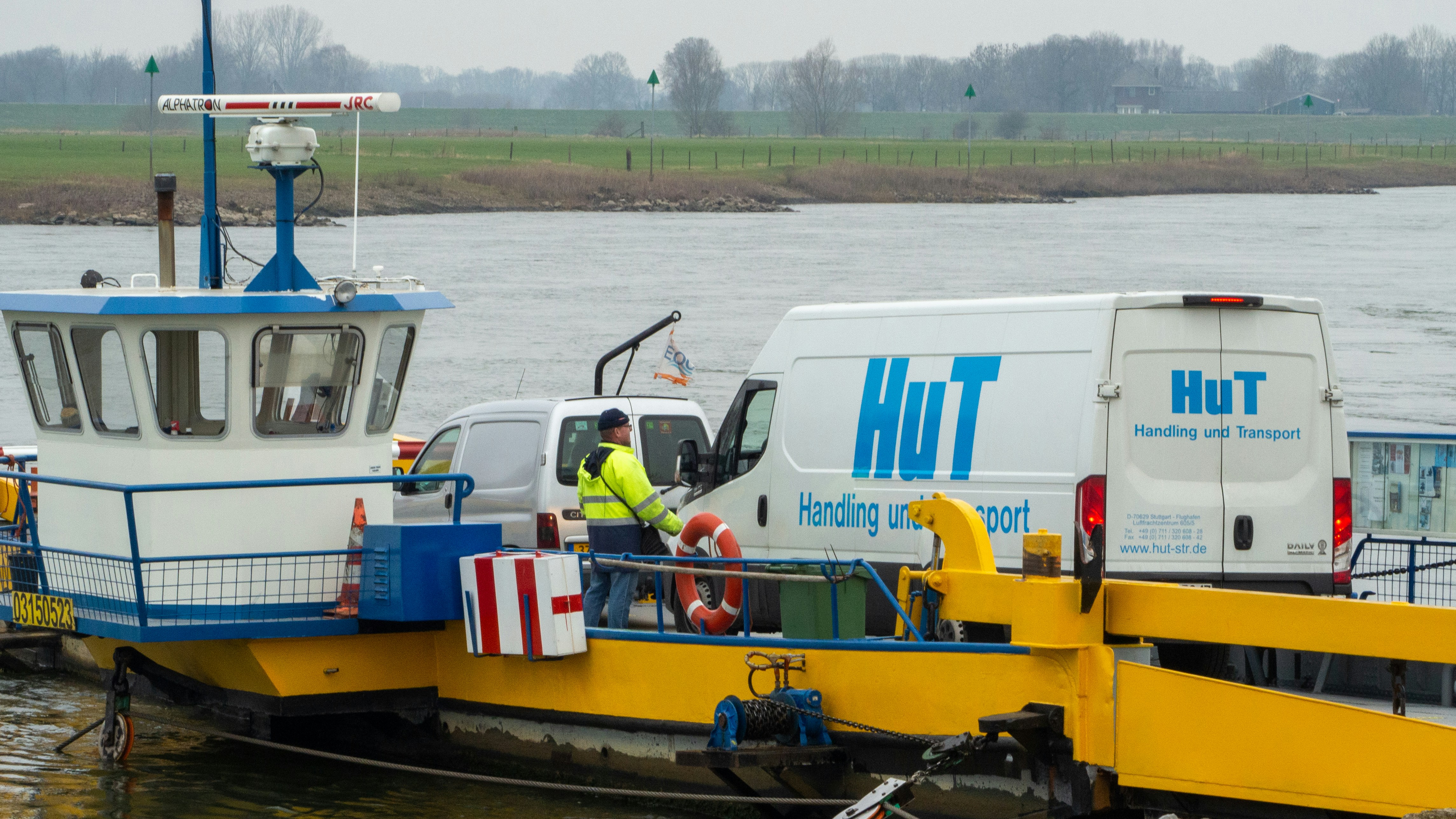 yellow and white boat on water during daytime