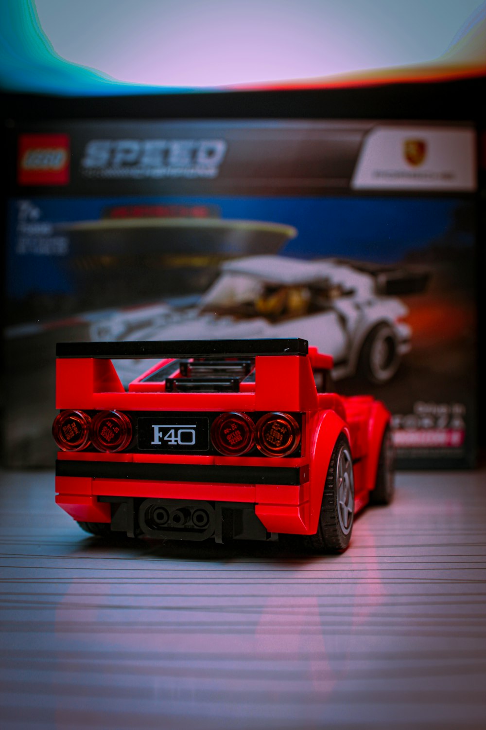 red and black chevrolet camaro scale model