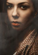 Close-up of a thoughtful actress Kajal Urmila Jain in character, eyes filled with emotion.