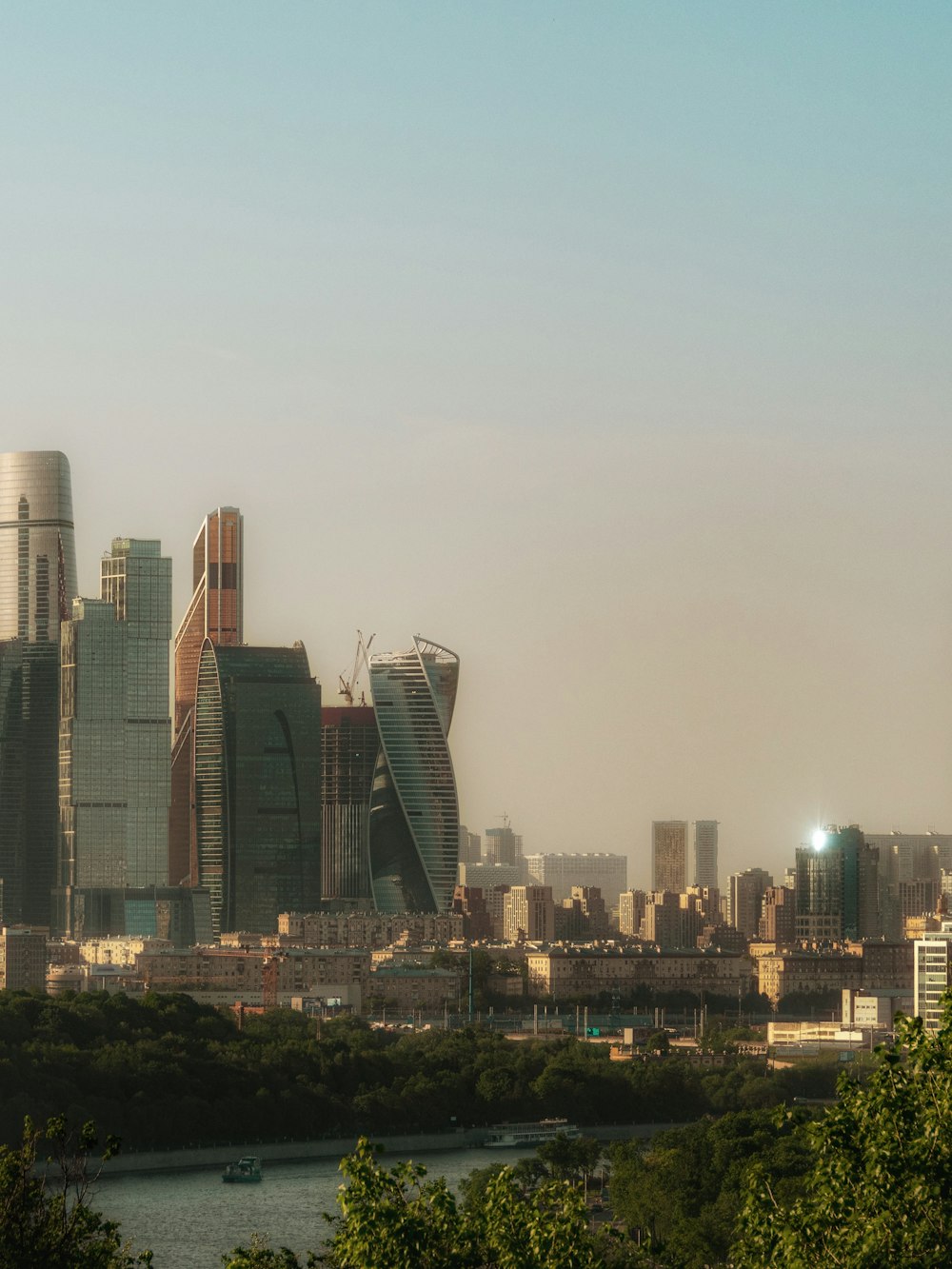 city skyline under gray sky during daytime