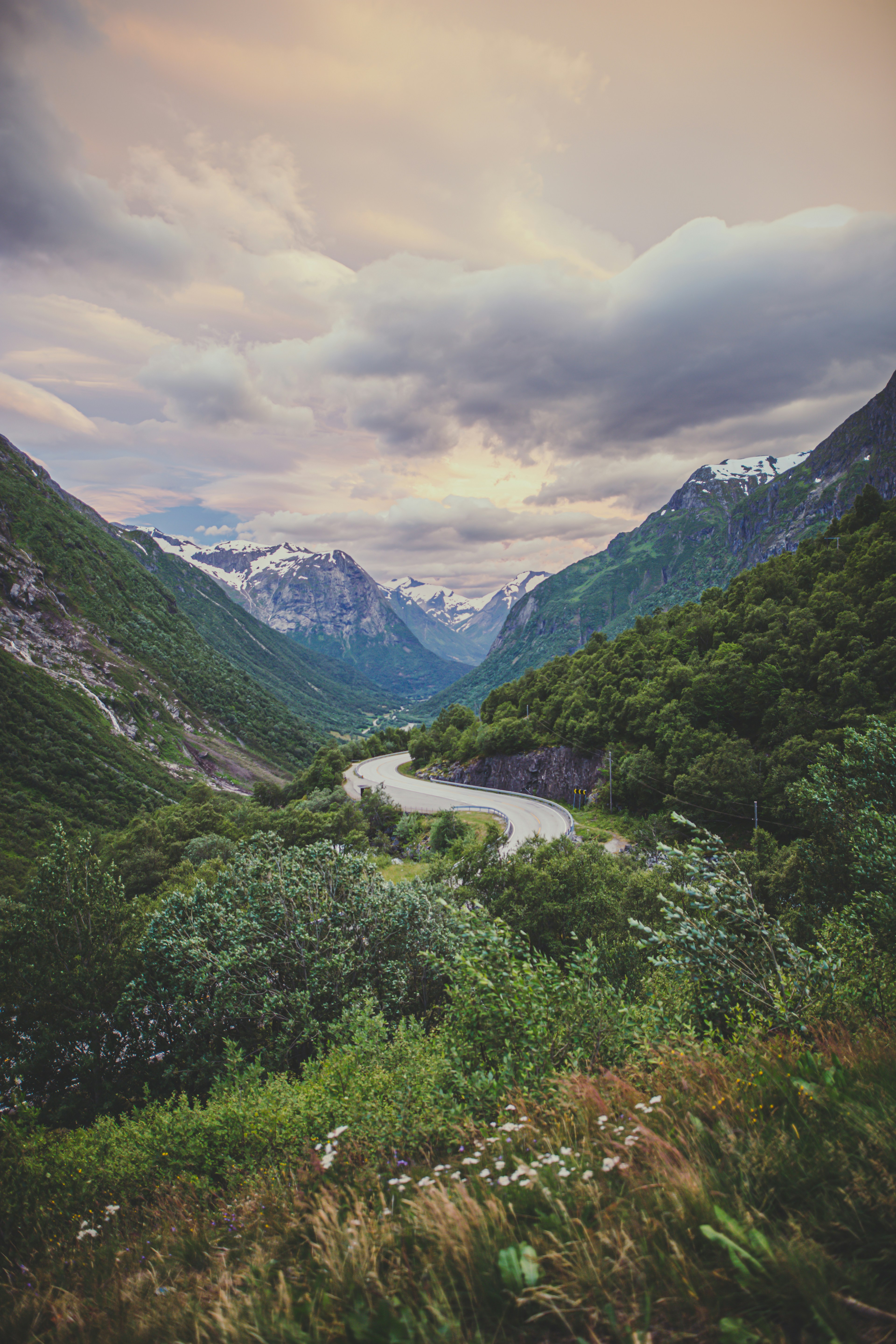 green mountains under cloudy sky during daytime