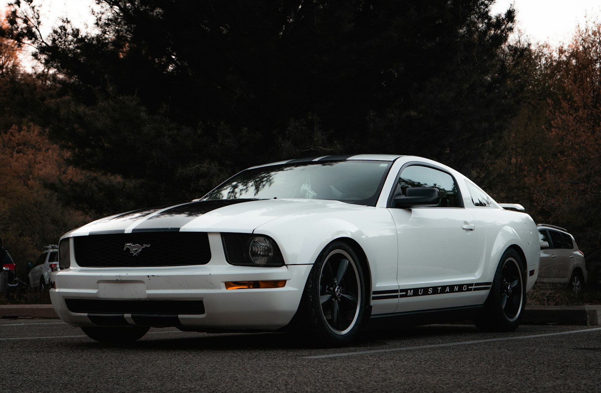 white porsche 911 on road during daytime