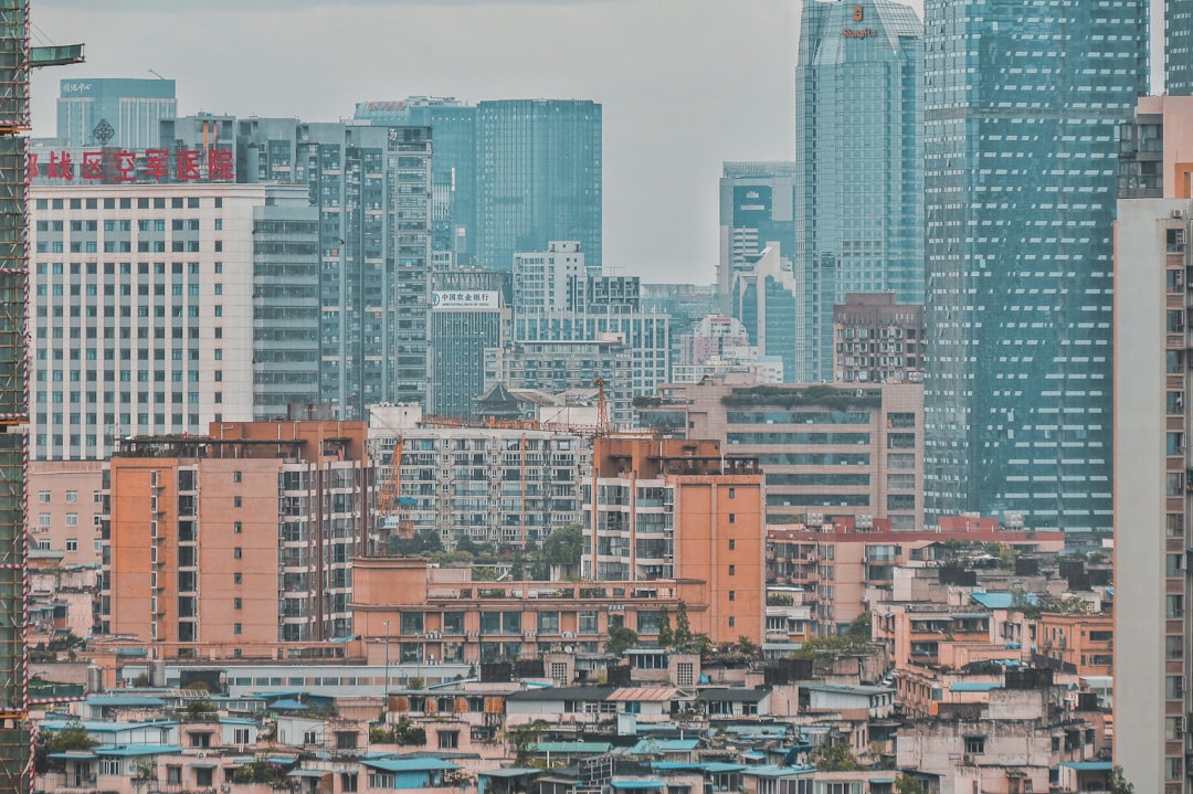 city with high rise buildings during daytime