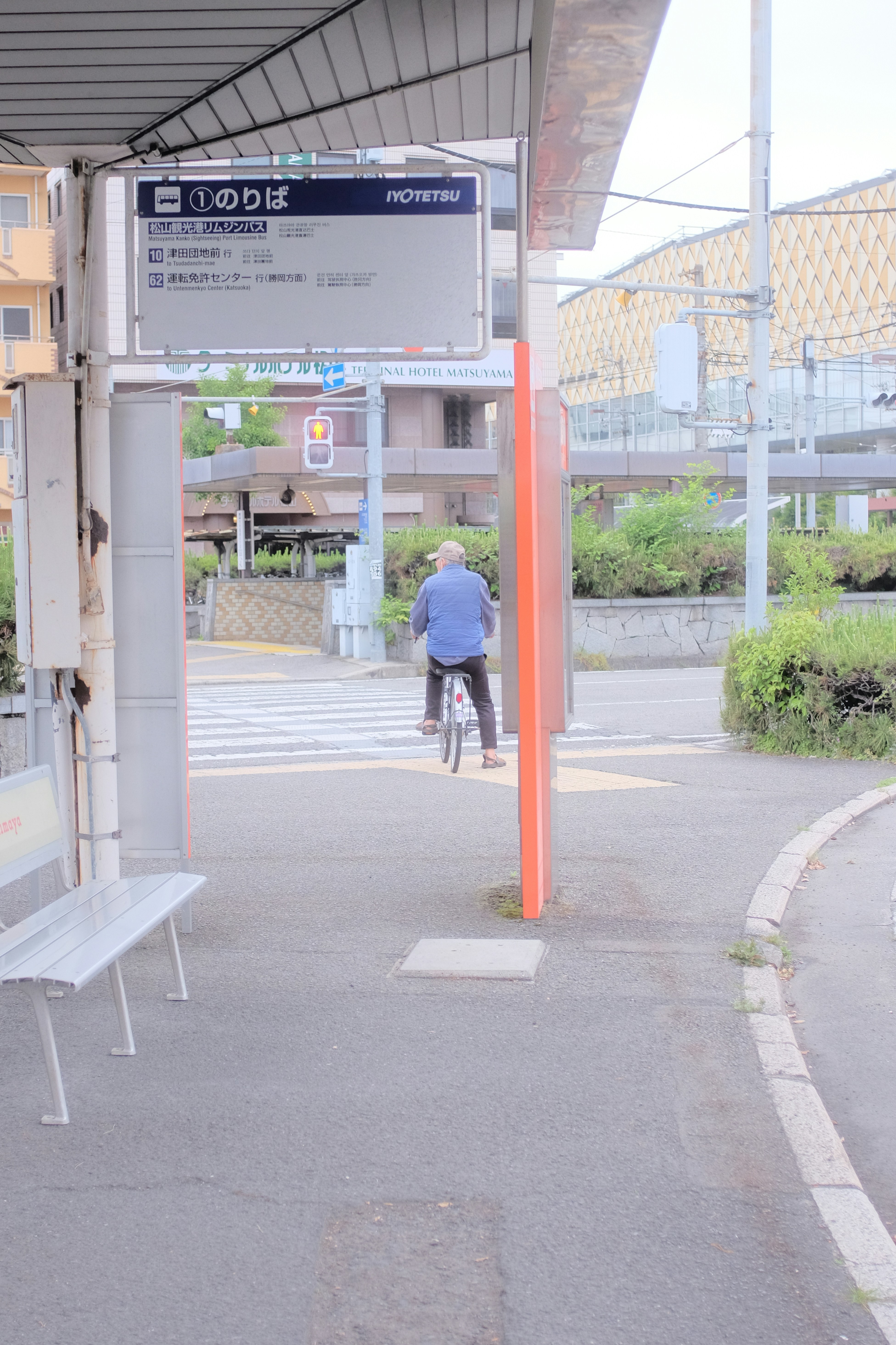 Man In Blue Shirt And Black Pants Walking On Sidewalk During Daytime Photo Free Human Image On Unsplash