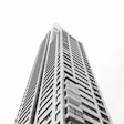grayscale photo of high rise building