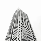 grayscale photo of high rise building