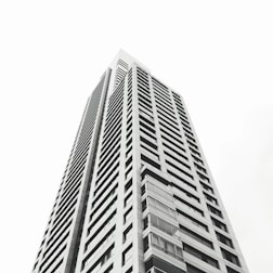 grayscale photo of high rise building