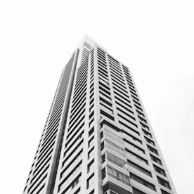 grayscale photo of high rise building