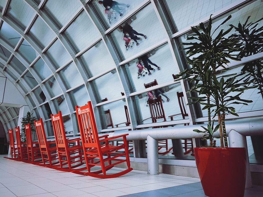 brown wooden chair near green indoor plant