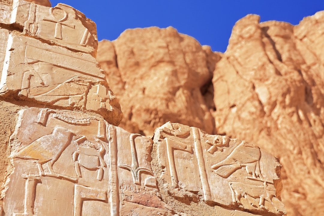 brown rock formation under blue sky during daytime