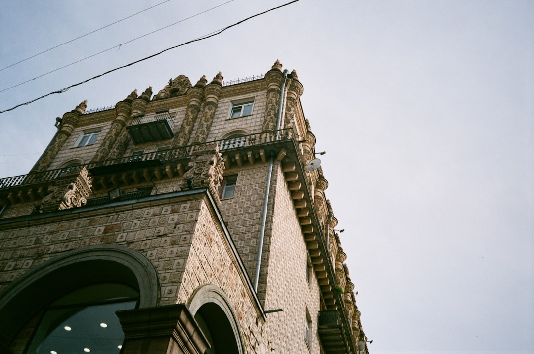 brown concrete building under white sky during daytime