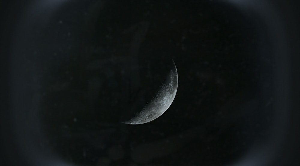 black moon in dark night sky