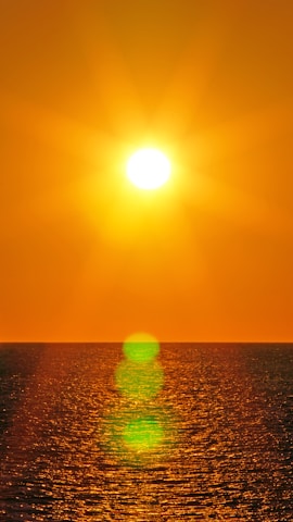 sun setting over the sea