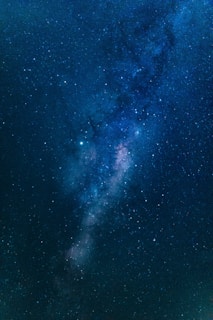 blue and black galaxy illustration