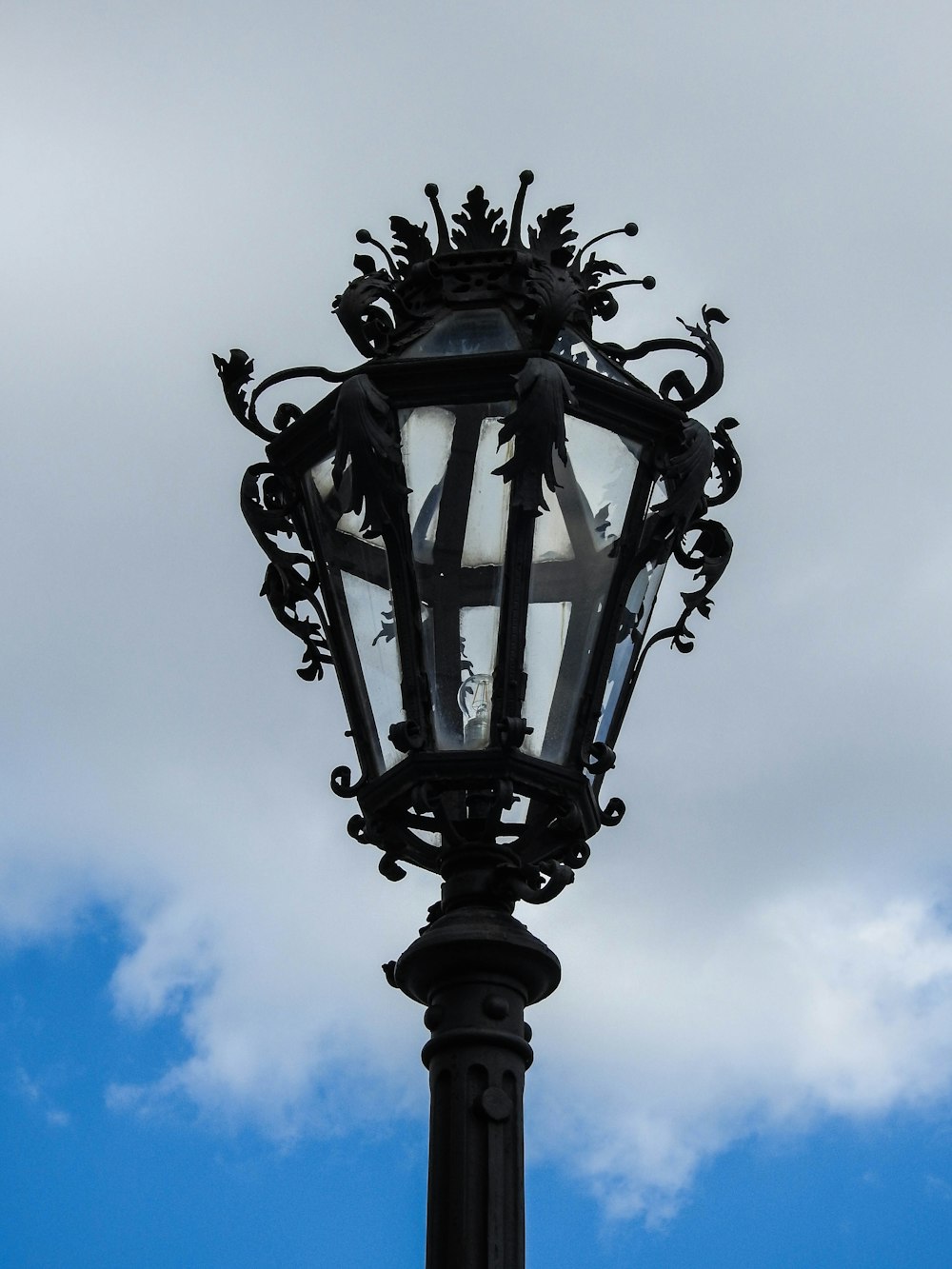 black metal framed lamp post