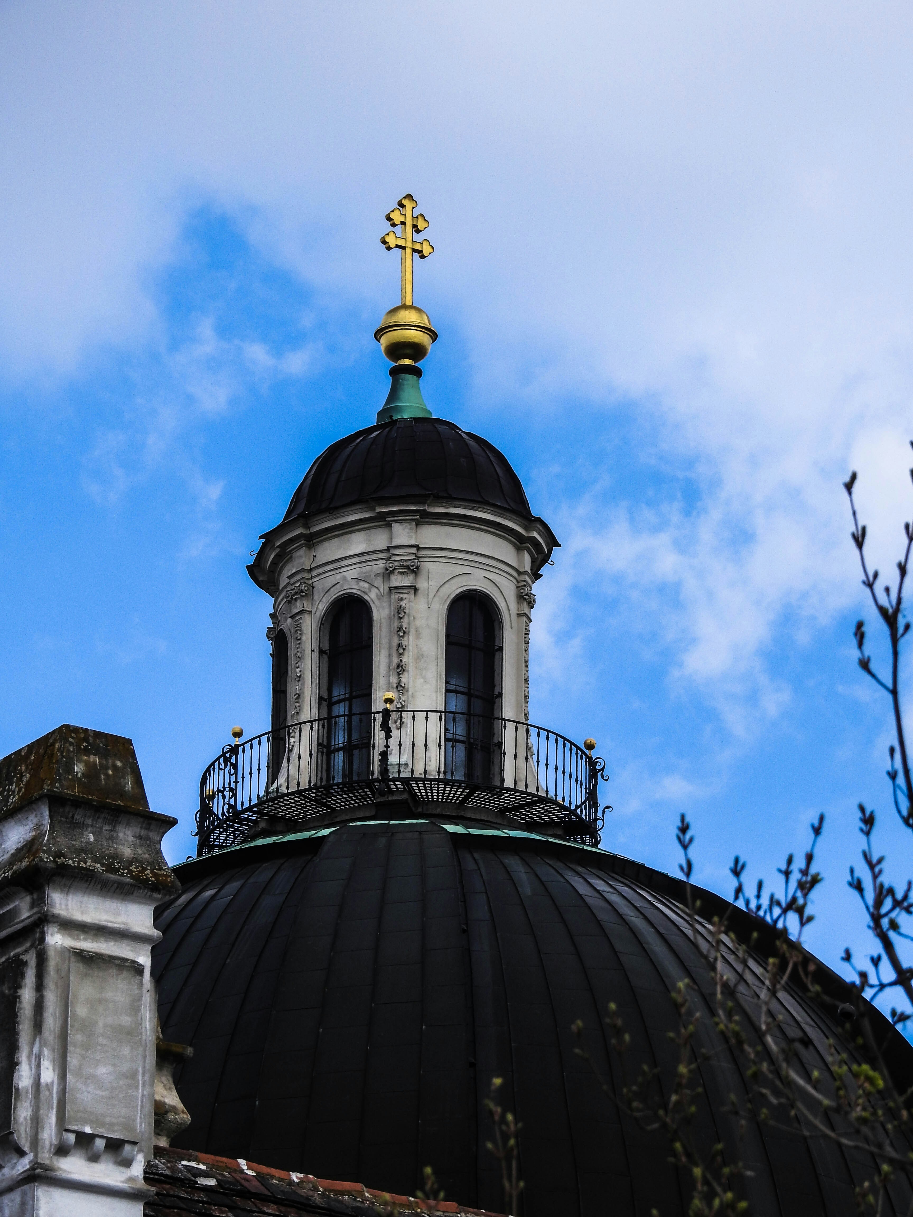 black and white concrete building under blue sky during daytime