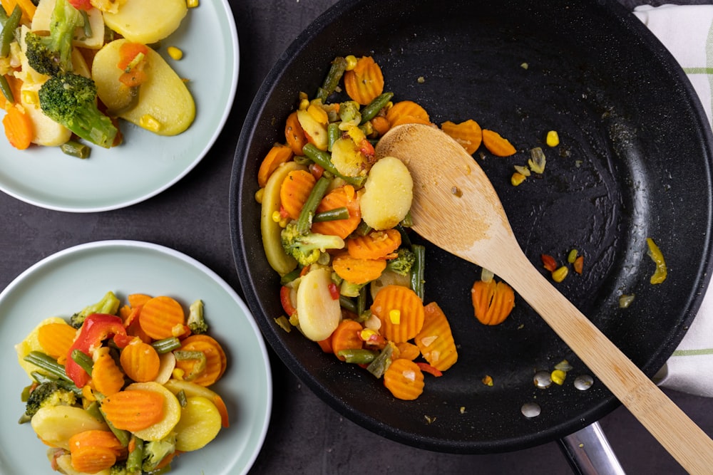 sliced vegetables on black ceramic plate