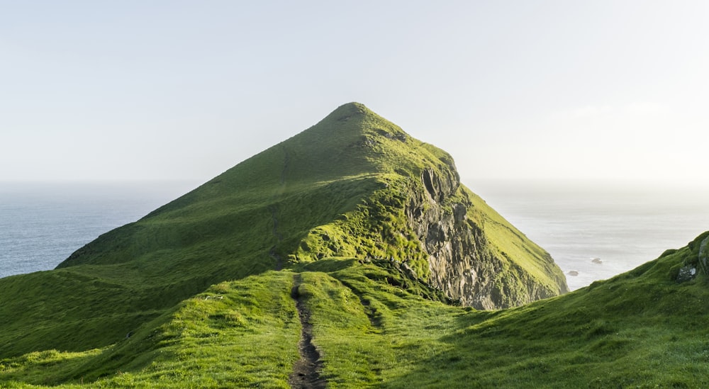 green mountain under white sky during daytime