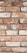 An arrangement of weathered red bricks with visible cracks and a slightly worn texture, set in gray mortar. The bricks are aligned in a uniform manner, showcasing a rustic and aged appearance.