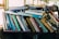 books on brown wooden shelf