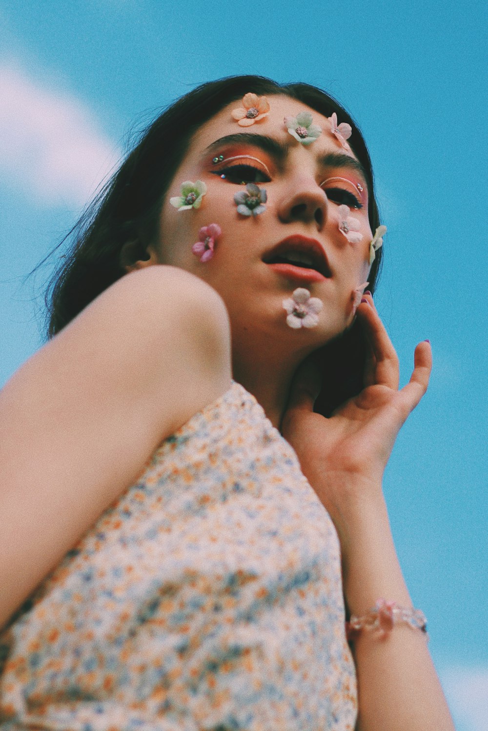 woman with white and blue floral dress