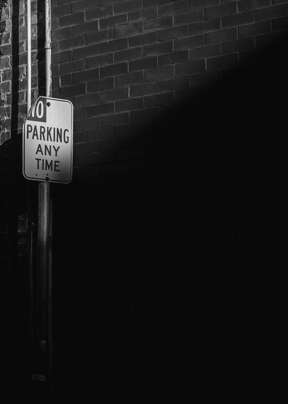 grayscale photo of stop sign