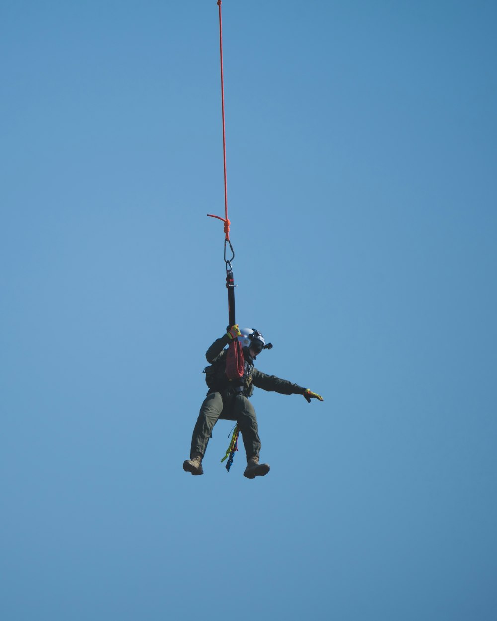 man in black jacket and pants jumping