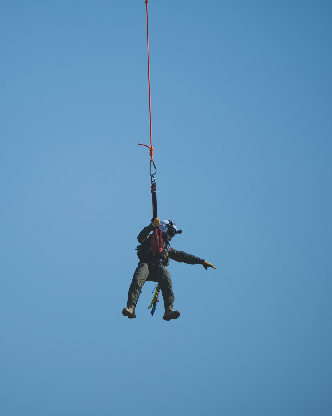  man in black jacket and pants jumping rope