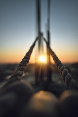 A close-up of a high performance UHMWPE double braid splice glowing under natural light.