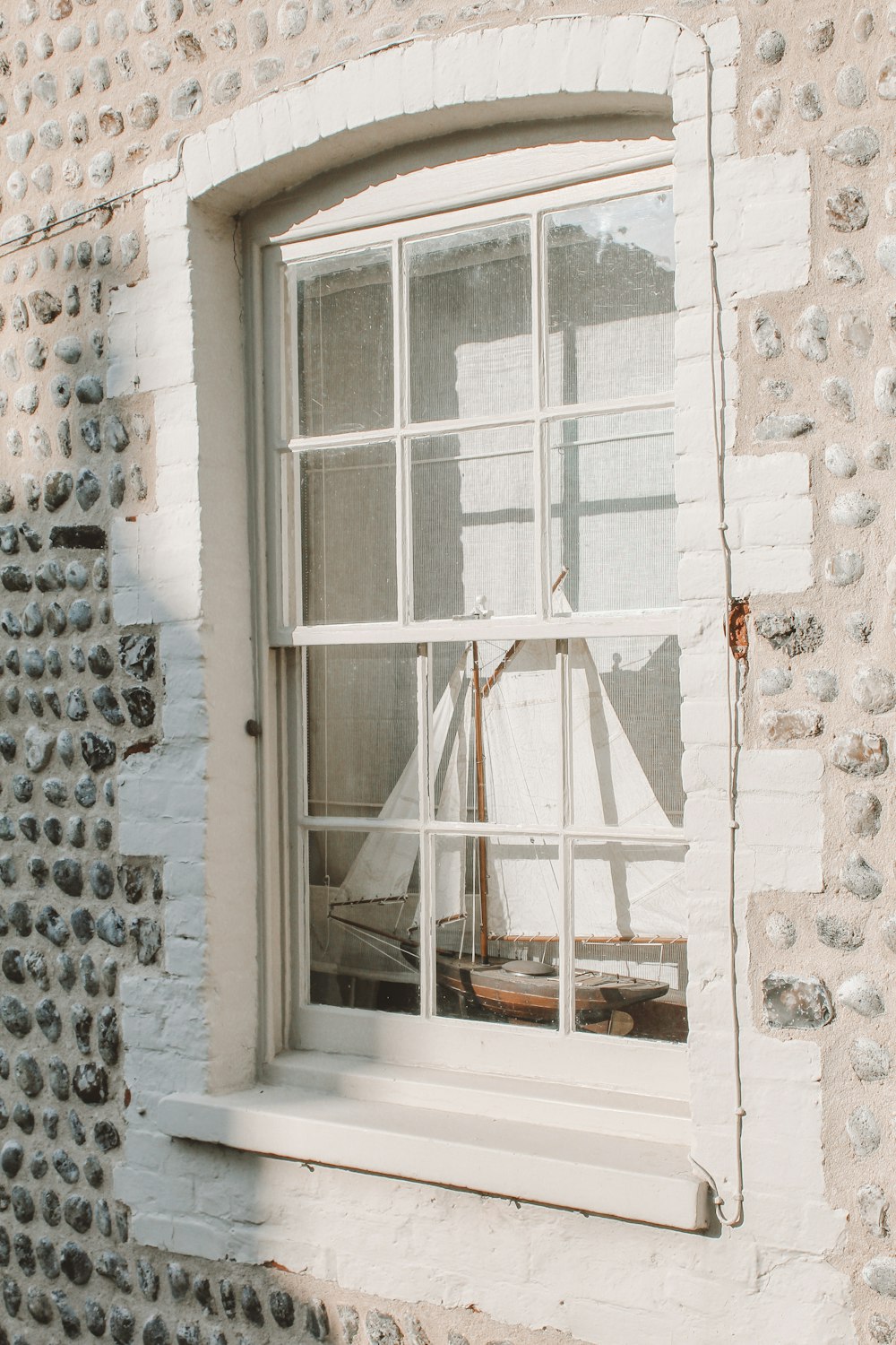 white and black floral window curtain