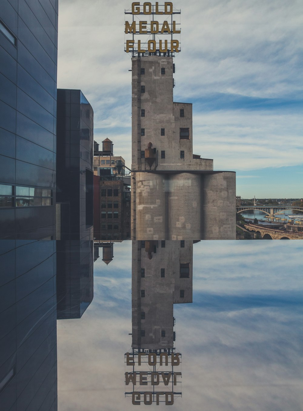 high rise building near body of water during daytime