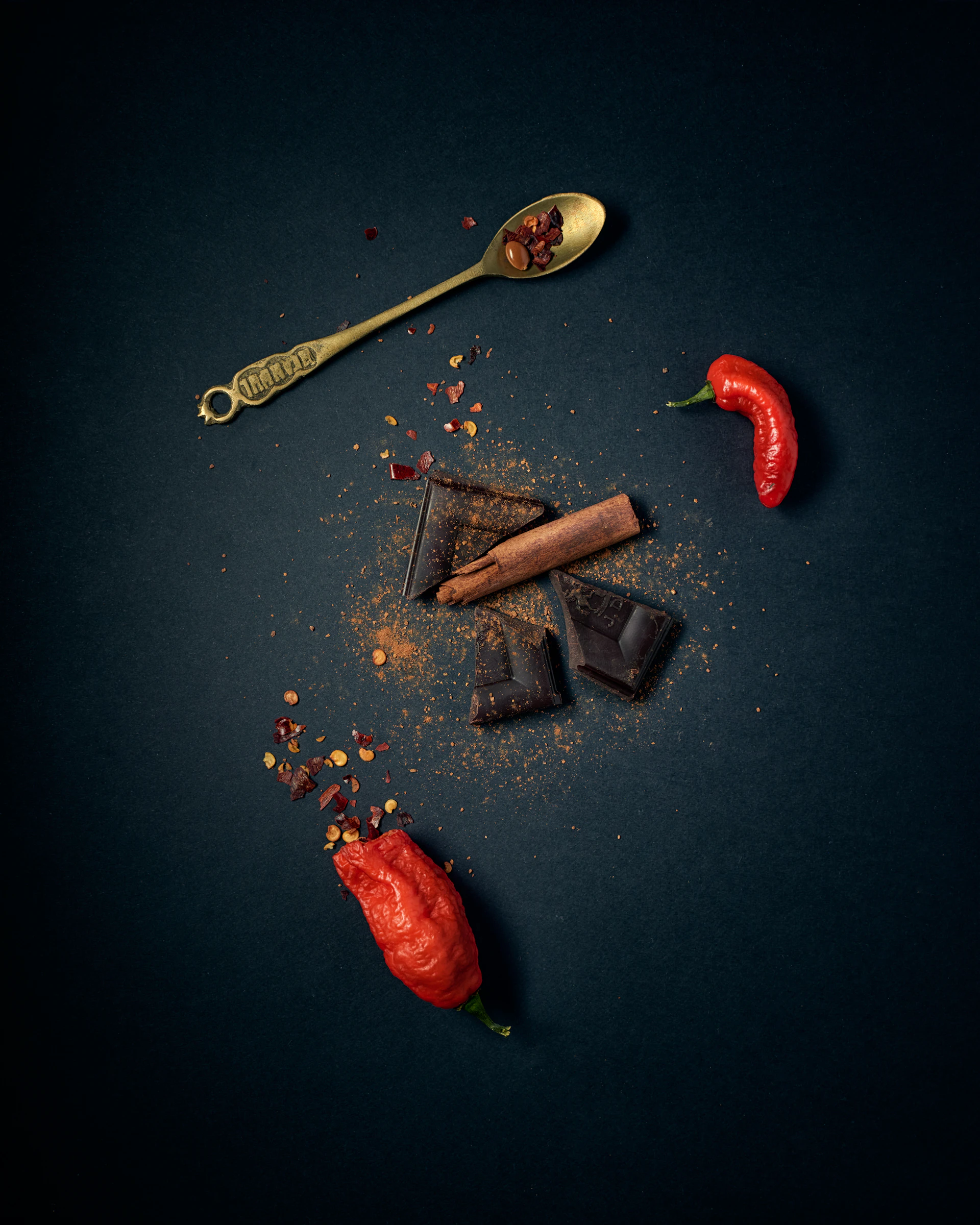 red chili pepper and stainless steel spoon