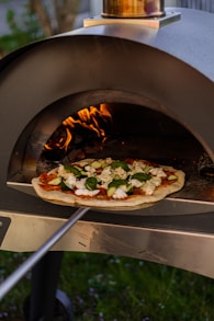pizza on white ceramic plate