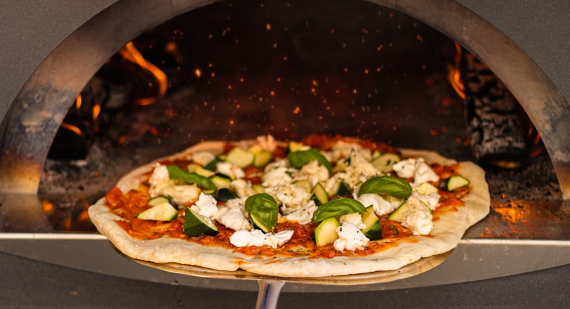 pizza on white ceramic plate