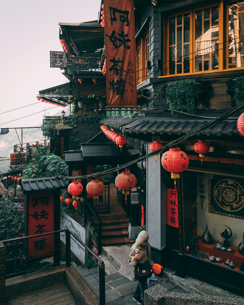 red chinese lanterns on top of building