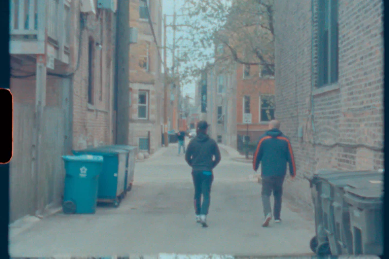 A pedestrian walking down a sidewalk in Chicago's Lincoln Park neighborhood