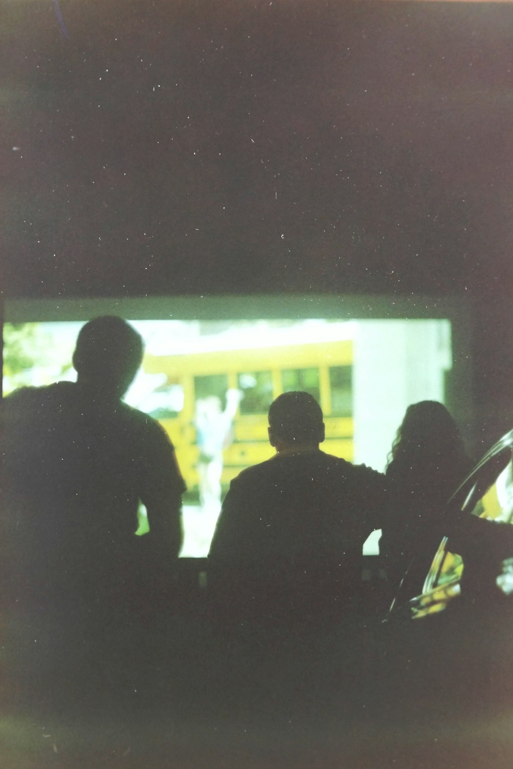 man in black shirt standing beside man in black shirt